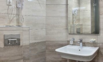 Эконом двухместный с 2 отдельными кроватями. Без окна в Максим Горький