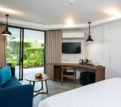 Двухместный номер Deluxe с видом на сад двуспальная кровать в Dewa Phuket Resort & Villas