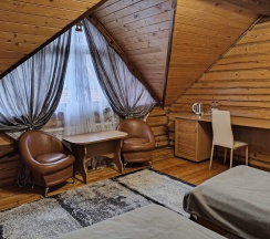Двухместный номер с раздельными кроватями в деревянном коттедже в Колыба