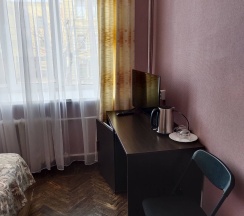Двухместный номер с 2 отдельными кроватями и общим туалетом в Луга