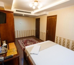 Четырёхместный люкс Двухкомнатный в Salut Hotel Almaty