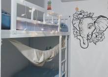 Кровать в общем номере в 1Sabai Hostel