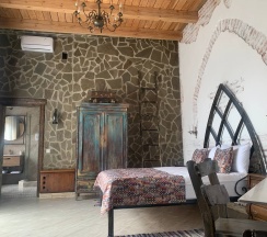 Комната в замке с одной кроватью в Валерия