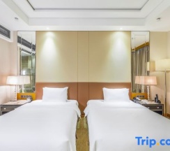 Двухместный номер Deluxe 2 отдельные кровати в Zhenhua Xinyue International Hotel