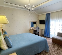 Двухместный номер с дополнительным местом в Сказка снежных вершин