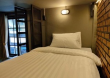 Кровать в общем номере в Premier Hostel Chiang Mai