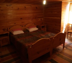 Комната эконом с 2 односпальными кроватями Кедровый дом (общие удобства) в Портал Белуха
