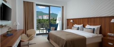 Номер делюкс с видом на горы в Приморье Grand Resort Hotel