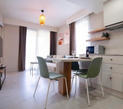 Люкс Deluxe с балконом в Bomo Suites