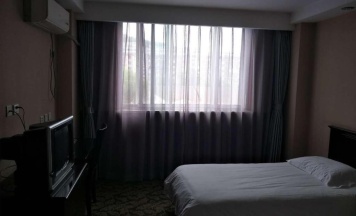 Двухместный номер Business 2 отдельные кровати в Huilong Tower Hotel
