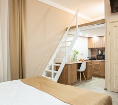 Четырёхместная семейная номер-студия Deluxe в Ботанический сад