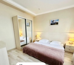 Четырёхместный номер Семейный с красивым видом из окна в Дом Гостей