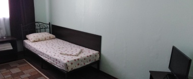 Комната с 2 односпальными кроватями (удобства на этаже) в Мираж