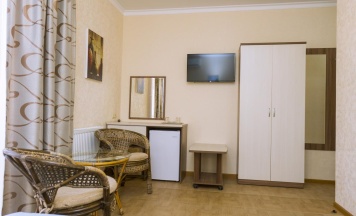 Номер стандарт с 2 односпальными кроватями с балконом в ТриО