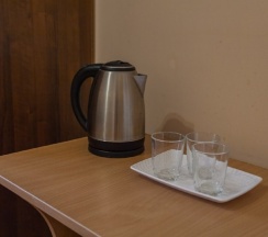 Двухместный номер комфорт с большой кроватью +доп.место, 1-4 человек и балконом в Гостевой дом