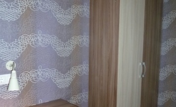 Кровать в общем номере (мужской номер) с красивым видом из окна в Бумeранг