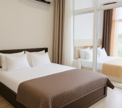 Апартаменты улучшенные с двумя 2-спальными кроватями кв. 204 в Deluxe apartments