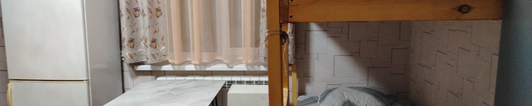 Кровать в 6-местном общем номере в Жара