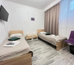 Номер стандарт с 2 односпальными кроватями (цокольный этаж) в Kovensky