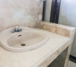 Кровать в общем номере в Kamuning Hostel