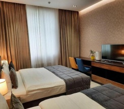 Двухместный номер Deluxe 2 отдельные кровати в Home Hotel