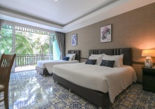 Трёхместный номер Deluxe pool view в Aranta Suvarnabhumi