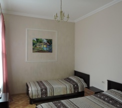 Номер стандарт улучшенный с 2 односпальными кроватями в Льгов