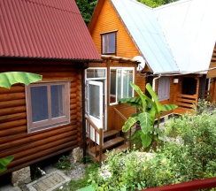 Коттедж с 2 комнатами с балконом в Тихая гавань