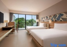 Двухместный номер Deluxe с балконом и с видом на бассейн в Le Méridien Phuket Mai Khao Beach Resort