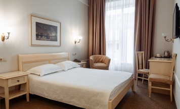 Стандартный с двухспальной кроватью в Astor Hotel 4*