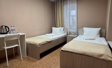 Двухместный номер с 2 раздельными кроватями и общей ванной комнатой в Берёза