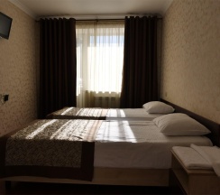 Номер стандарт с 4 односпальными кроватями (с завтраком) в Yeti House