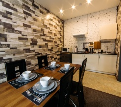 Апартаменты с видом на город в City apartments-deluxe room