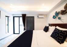 Номер Standard в RoomQuest Sukhumvit 36 BTS Thonglor