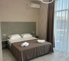 Четырёхместный номер Standard с балконом в Сюзэн