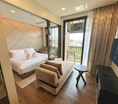 Двухместный номер Deluxe двуспальная кровать в The Proud Karon Beach Phuket Trademark Collection By Wyndham