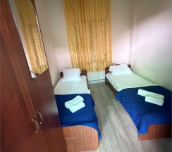 Двухместный  номер эконом с отдельными кроватями в День-Ночь