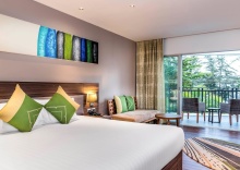 Двухместный номер Deluxe с балконом двуспальная кровать в Novotel Phuket Karon Beach Resort And Spa - SHA Extra Plus