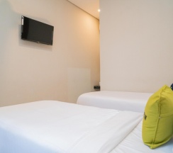 Двухместный номер Superior 2 отдельные кровати в Urbanview Hotel Bubusini Batu by RedDoorz