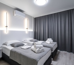 Двухместная студия Deluxe с балконом двуспальная кровать в Апартаменты Новая в Престижном ЖК Минск-Мир