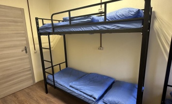 Кровать в 4-местном общем мужском номере в Точка