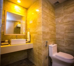 Кровать в общем номере в Austin Park Hotel