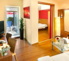 Трёхместный люкс в Leonardo Hotel Salzburg City Center