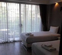 Двухместный номер Deluxe 2 отдельные кровати в Inn Place Serviced Residence