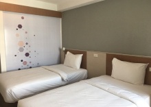 Двухместный номер Standard с балконом 2 отдельные кровати в Ingnaam Hotel