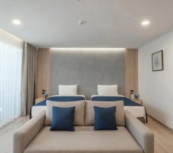 Двухместный номер Premier с видом на море двуспальная кровать в Sunbeam Hotel Pattaya