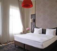 Номер Classic c двуспальной кроватью в Mercure Rostov on Don Center