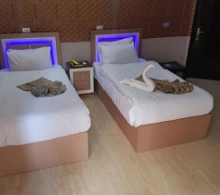 Трёхместный номер Comfort с 3 комнатами с видом на город в Отель Cairo