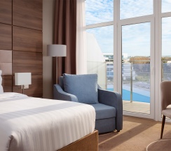 Номер Deluxe с балконом и видом на бассейн - с 2 односпальными кроватями в Movenpick Resort&SPA Anapa Miracleon
