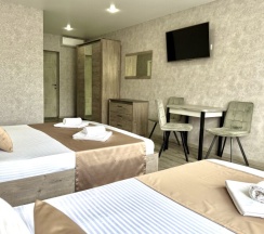 Трехместная комната комфорт в Корнилофф от Травел Хотелс Антураж